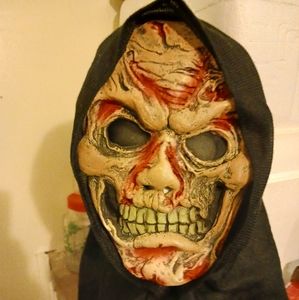 DECORATIVE..GRUESOME..RUBBER  AND FABRIC HOLLOWEEN MASK..